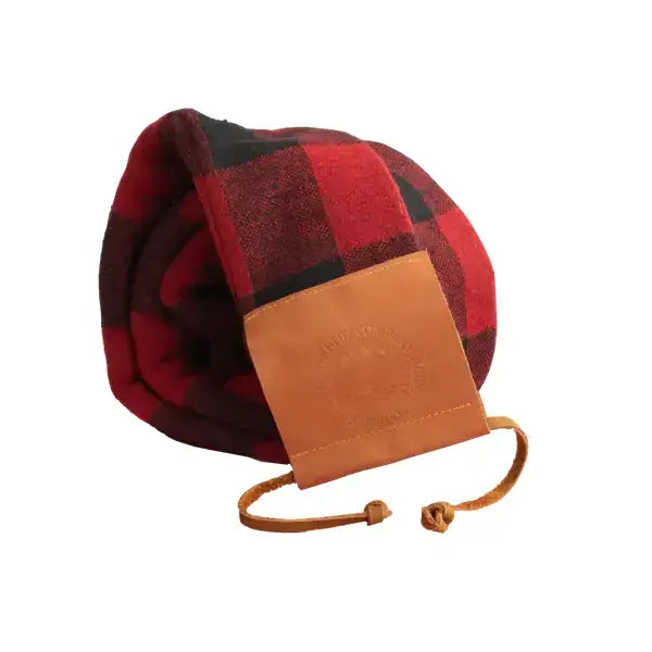 Bear Archery longbow with a protective sleeve, showcasing its sleek design and craftsmanship.