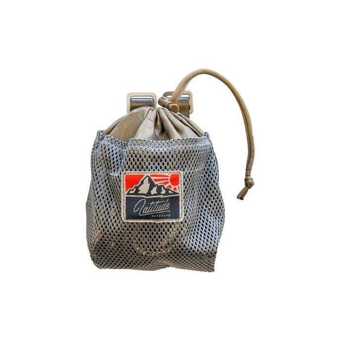 Latitude Outdoors Plus Method Dump Pouch in use, showcasing its durable fabric, spacious design, and adjustable straps, ideal for outdoor activities like hunting or hiking.