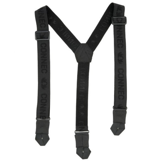 Person wearing Connec Outdoor plus suspenders, showcasing a stylish and functional outdoor outfit, with a scenic nature backdrop.