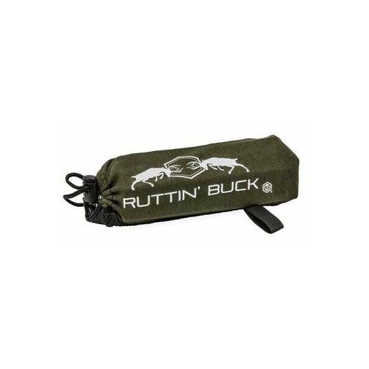 An outdoor scene featuring Hunters Specialties gear alongside the Sac Ruttin' Buck Rattling device, showcasing a hunter preparing for a successful deer hunting experience in a natural setting.