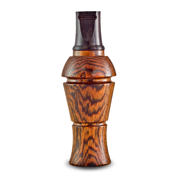 An artistic design featuring Recall Designs combined with a bocote wood crow call, showcasing intricate patterns and textures.
