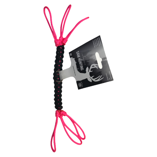 Les Produits Sam Hunting pink and black small game carrier, designed for efficient transport of small game.