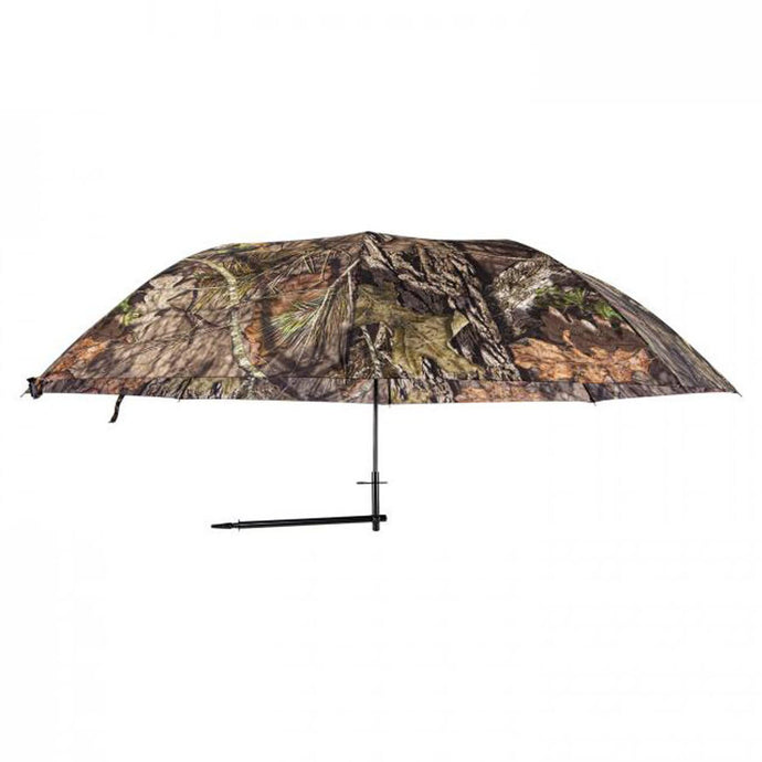 Ameristep Plus Hunter's Umbrella set up in a wooded hunting environment, providing shelter and camouflage for hunters, with a focus on its durable fabric and adjustable height features.