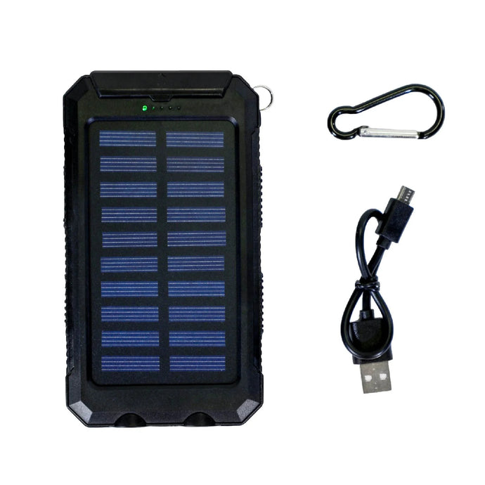 Clutch Outdoors Plus solar charger positioned in a natural outdoor setting, showcasing its sleek design and solar panels under sunlight, ideal for charging devices on camping trips or outdoor adventures.