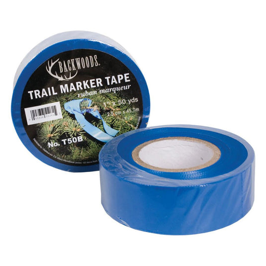 Backwoods cigar pack alongside a blue marker on a wooden surface.