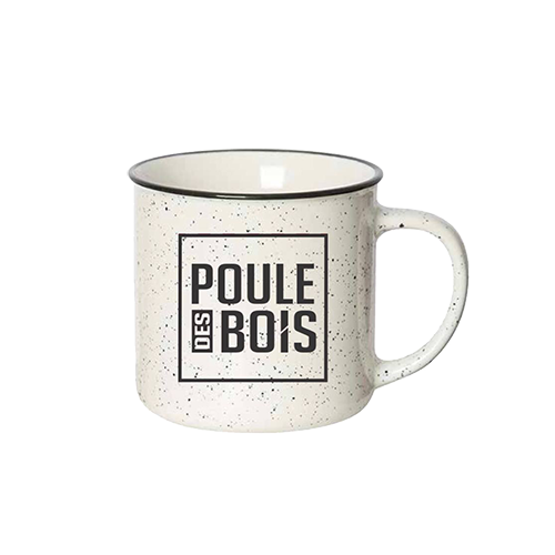 A cozy wooden table set in a rustic cabin, featuring a beautifully crafted Poule des Bois, a traditional French wooden hen, alongside a charming Tasse Poule des Bois, a decorative cup adorned with hen motifs, both exuding warmth and artisanal craftsmanship.