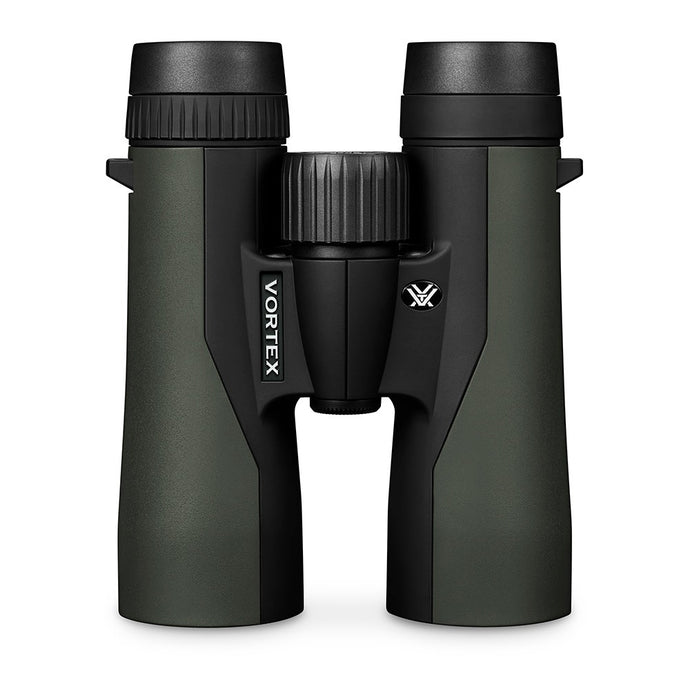 Close-up of the Plus Jumelles Crossfire HD 10x42 binoculars, showcasing their sleek design, durable rubber armor, and high-quality optics, set against a natural outdoor backdrop.