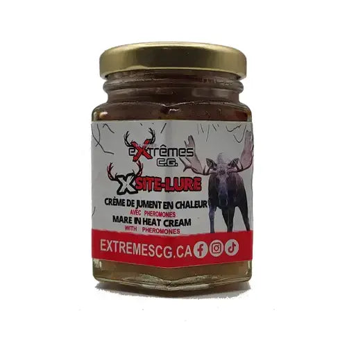 Extreme CG Plus X-Site Lure 110ml bottle featuring a sleek design with vibrant colors, showcasing its label with detailed product information, set against a natural outdoor background to emphasize its use in fishing.